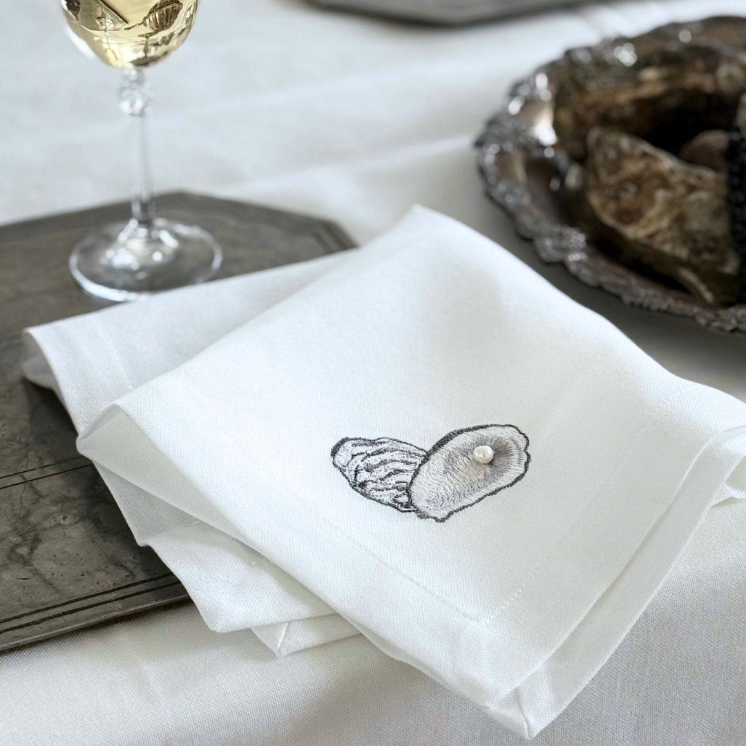 Serviett med østers perle