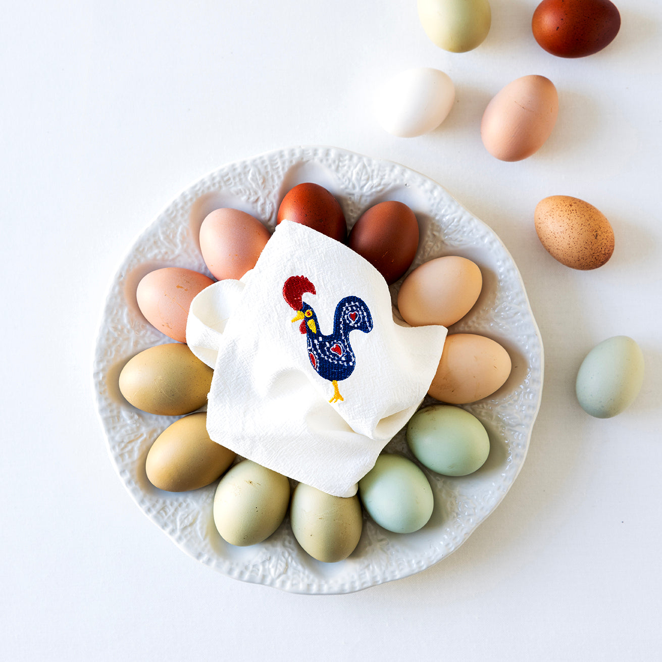 Serviett med brodert hane